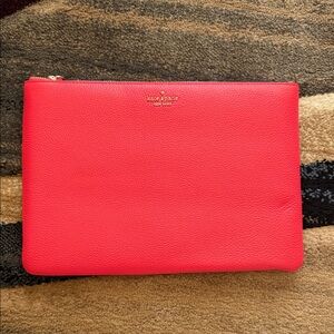 Kate Spade Vibrant salmon colored Pouch